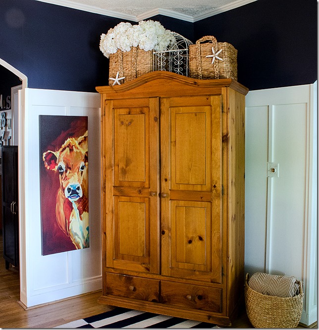 navy-white-living-room-board-batten-reveal-cow-art navy-white-living-room-board-batten-reveal-cow-art