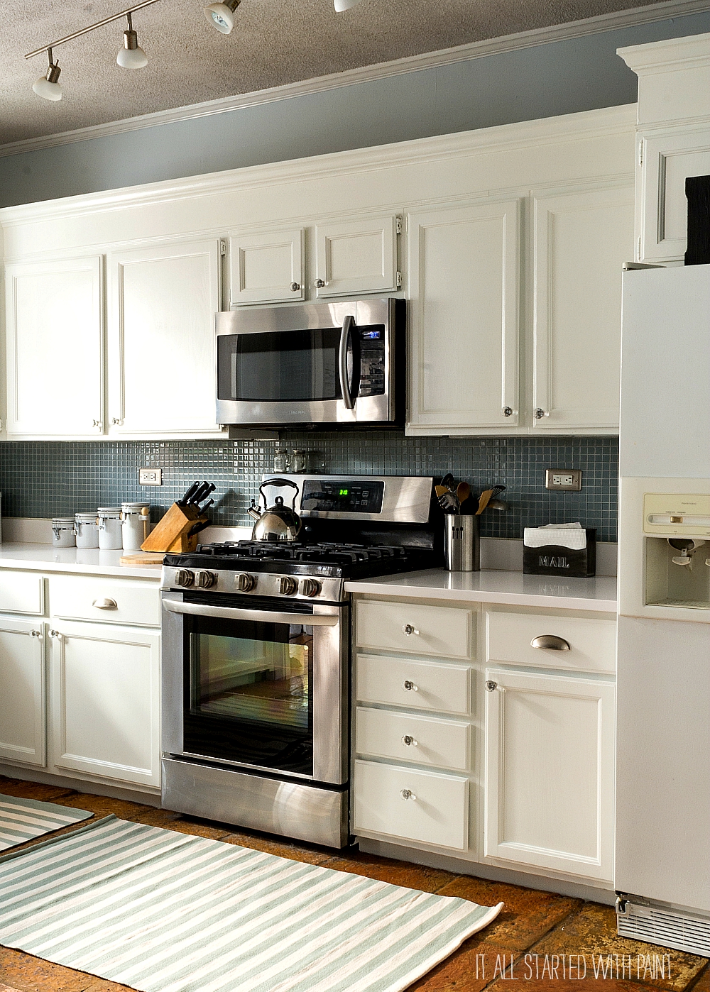Builder Grade Kitchen Makeover with White Paint