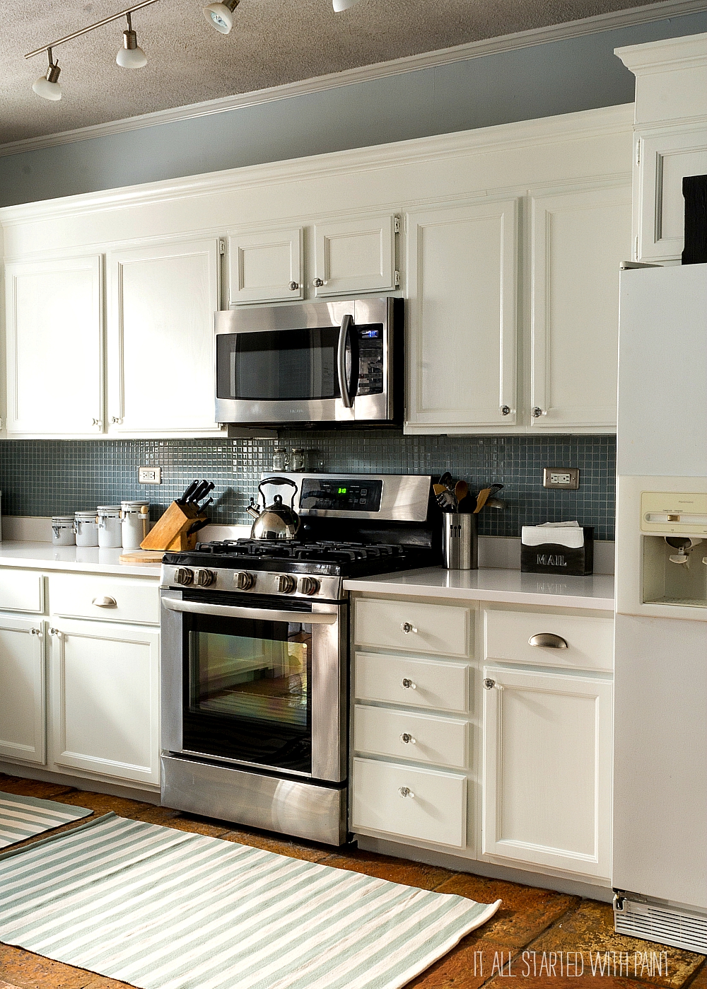 Builder Grade Kitchen Makeover With White Paint