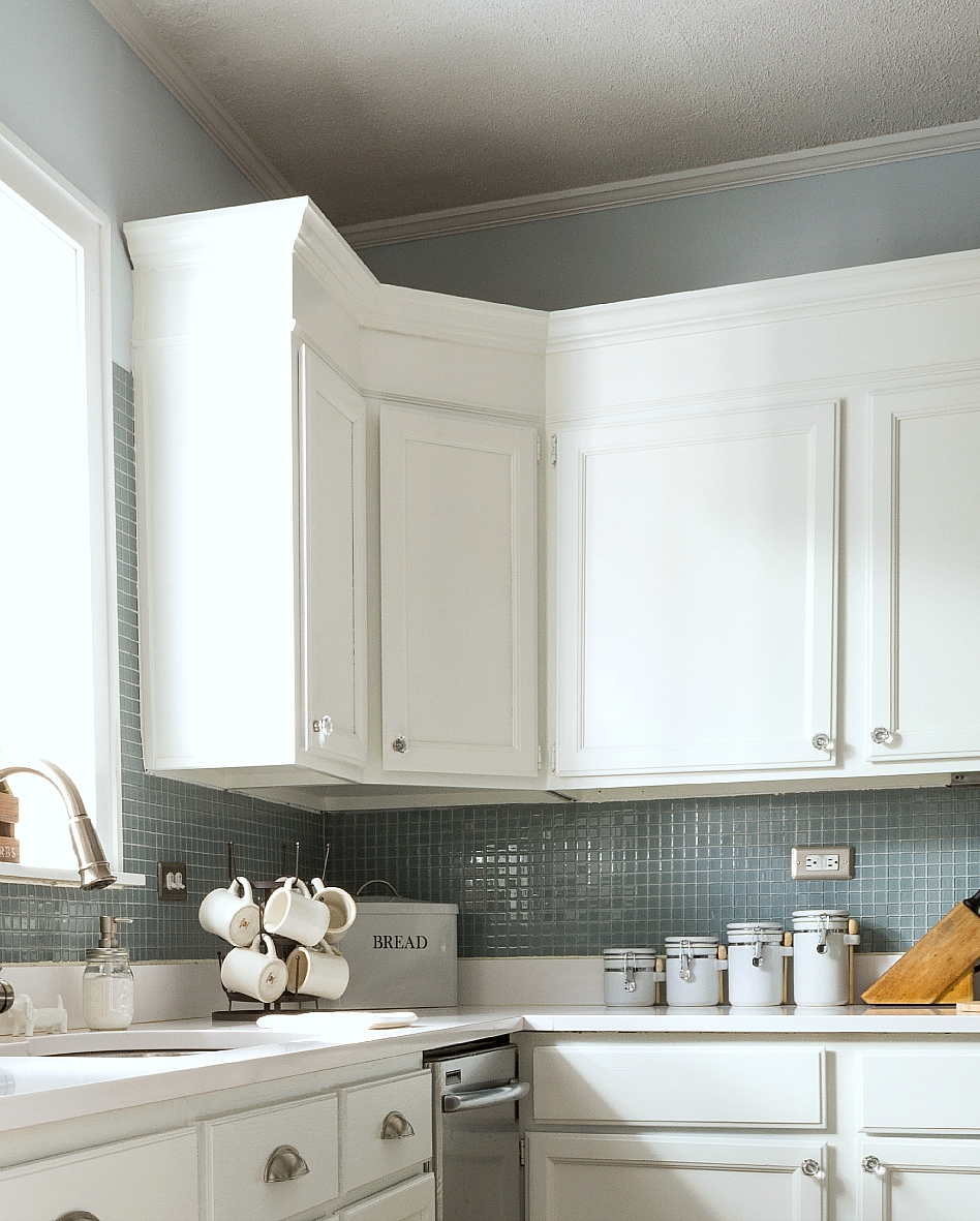 adding-height-to-white-kitchen-cabinets-white-counter-tops-blue-gray-backsplash (10 of 21) 1