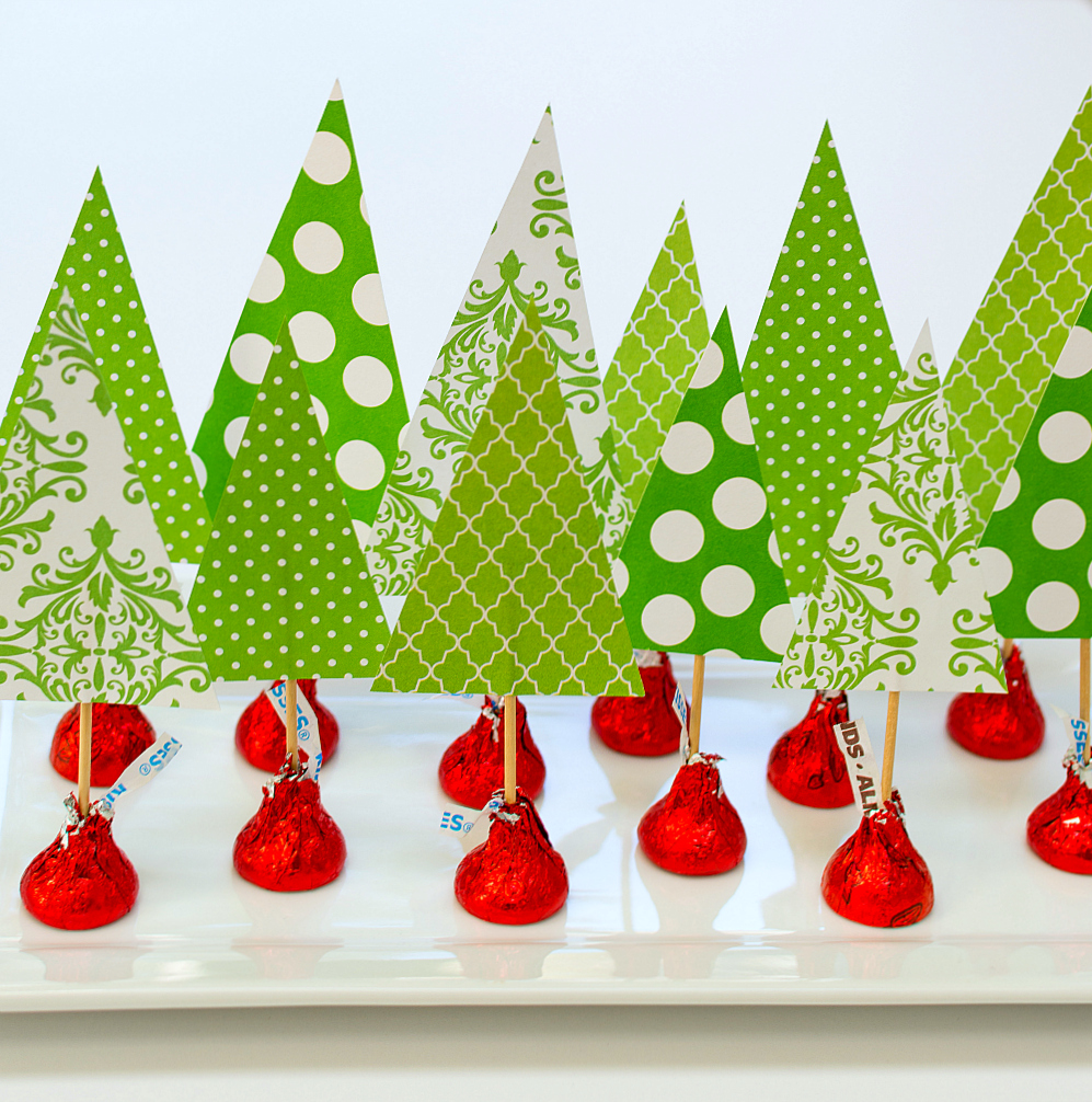 Christmas Crafts with Kids and Kisses. Easy kids crafts for Christmas. Easy paper tree centerpiece. Tutorial on how to make a Christmas tree centerpiece with Scrapbook Paper and Hershey Kisses. Holiday-Centerpiece-Idea-Hershey-Kiss-Mas-Tree-Forest-Wine-Corks