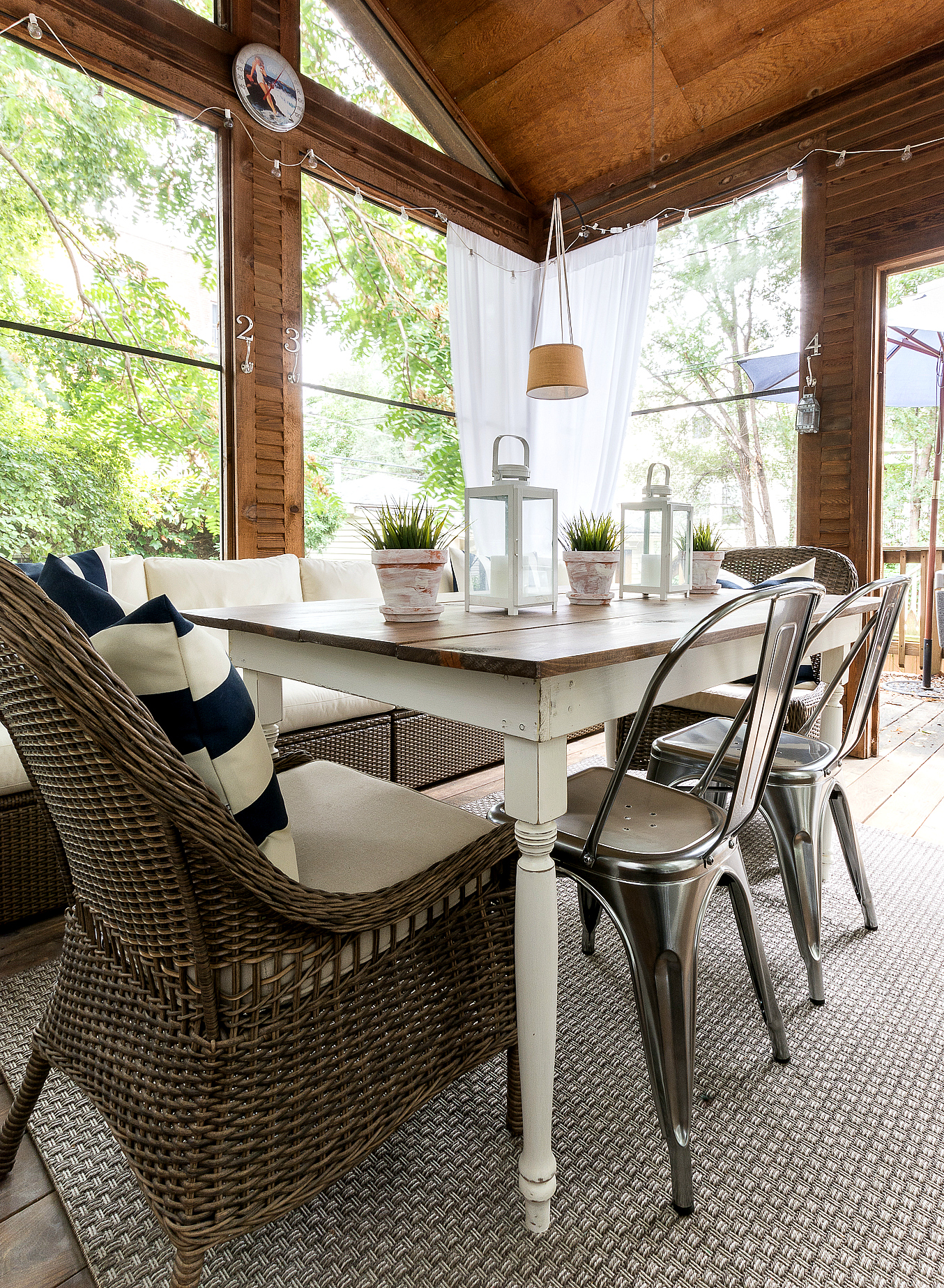 farmhouse-table-wicker-and-metal-chairs-screen-porch-3-1
