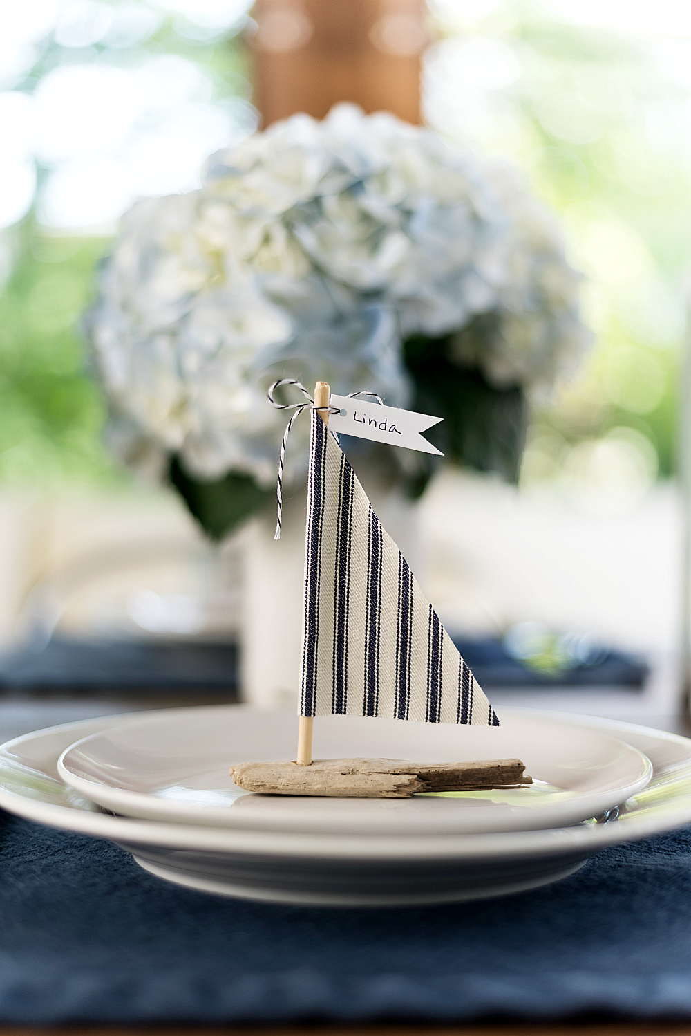 Navy, white table setting idea for summer wedding