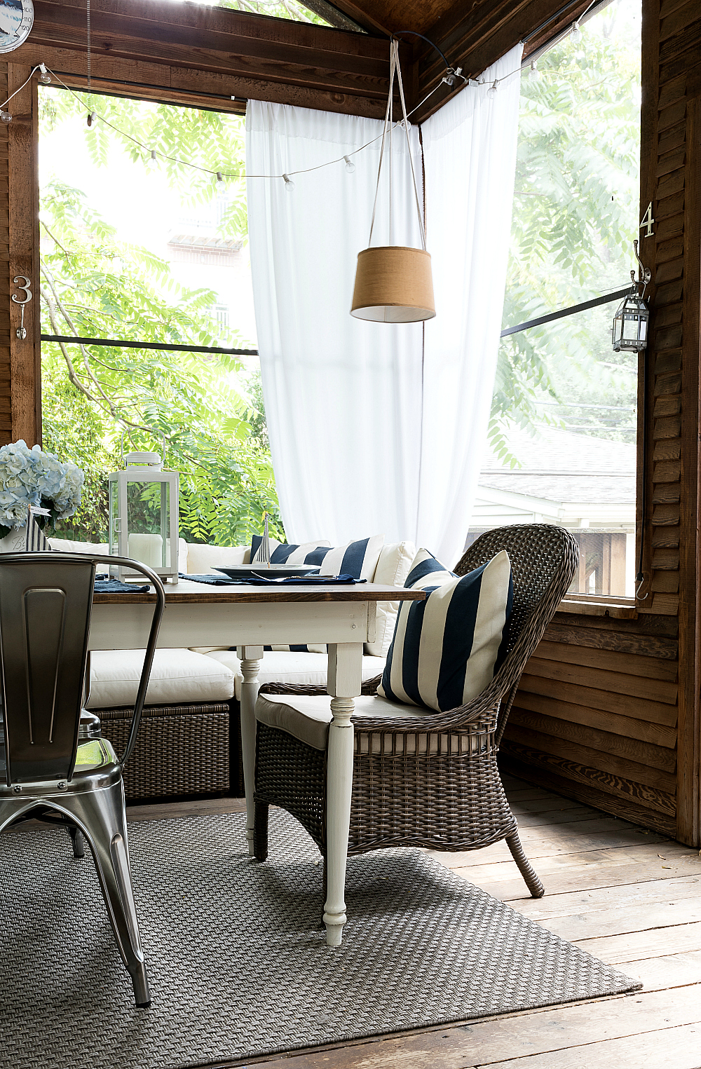 Navy white screen porch decor and summer table setting