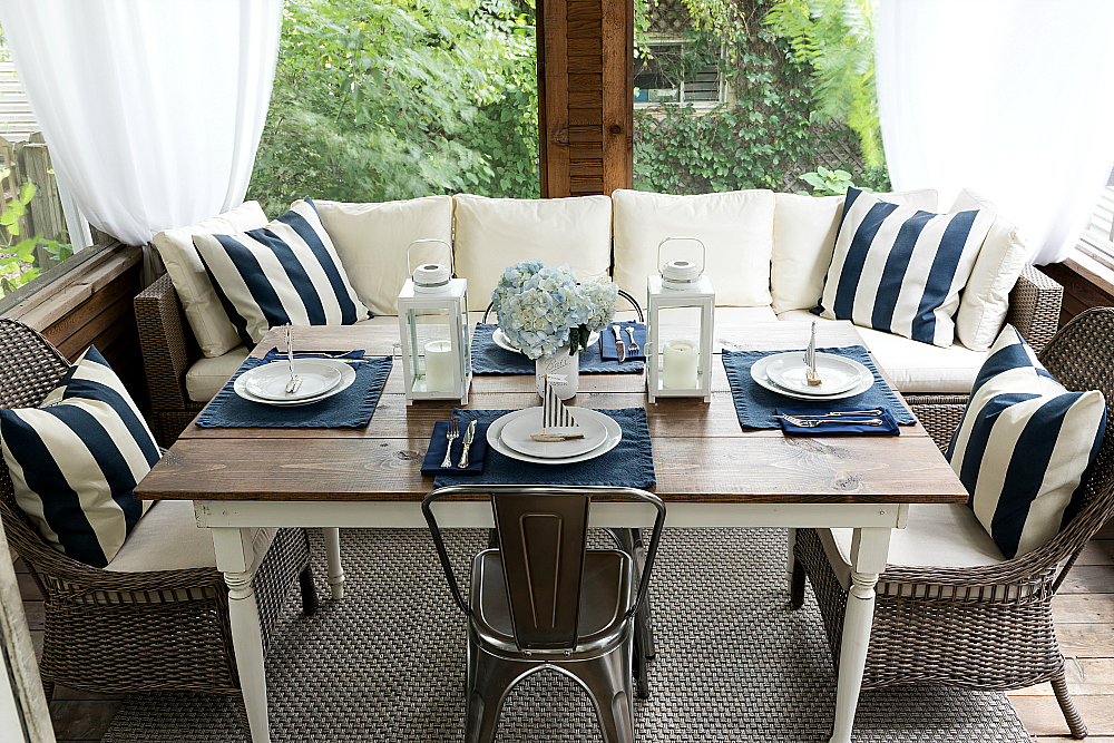 Nautical Table Setting in Navy White with driftwood sailboat place card holders