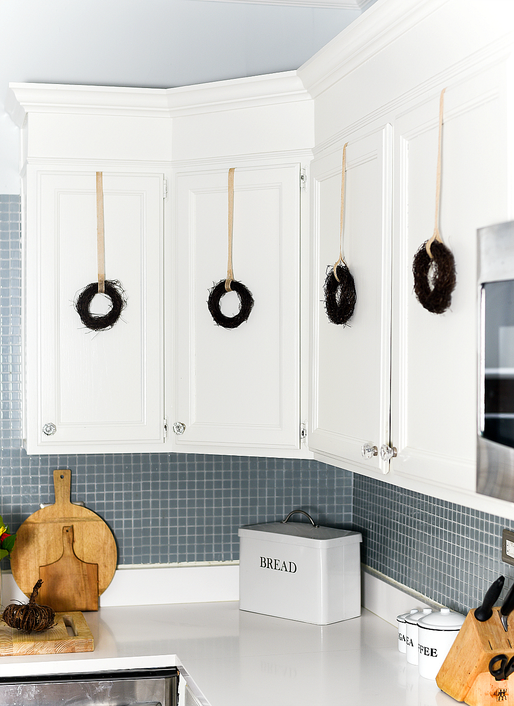 Mini Wreaths on Kitchen Cabinets