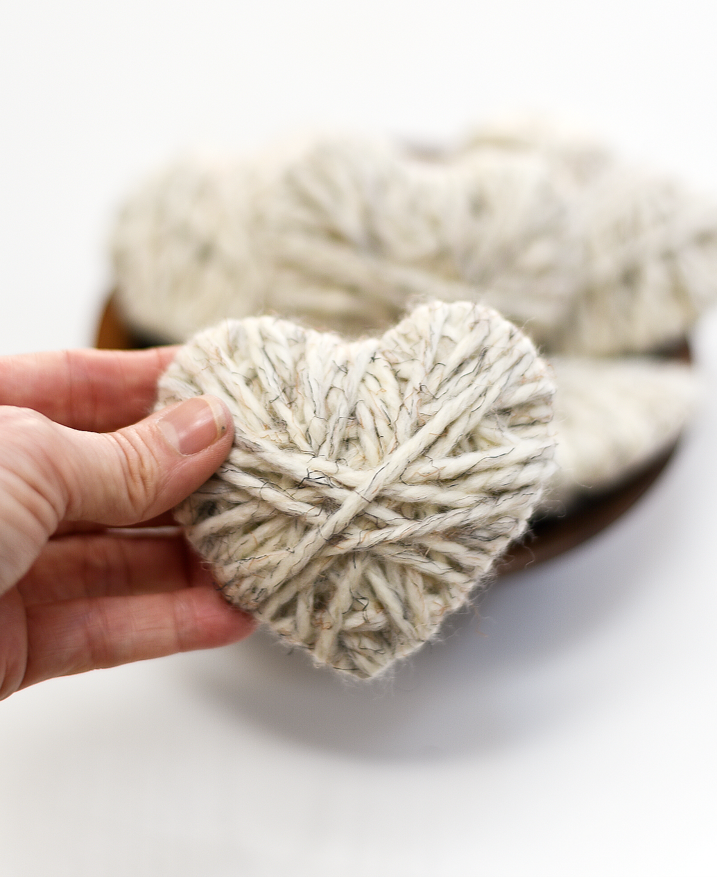 Neutral Valentine's Day Decor Ideas with Yarn Wrapped Hearts