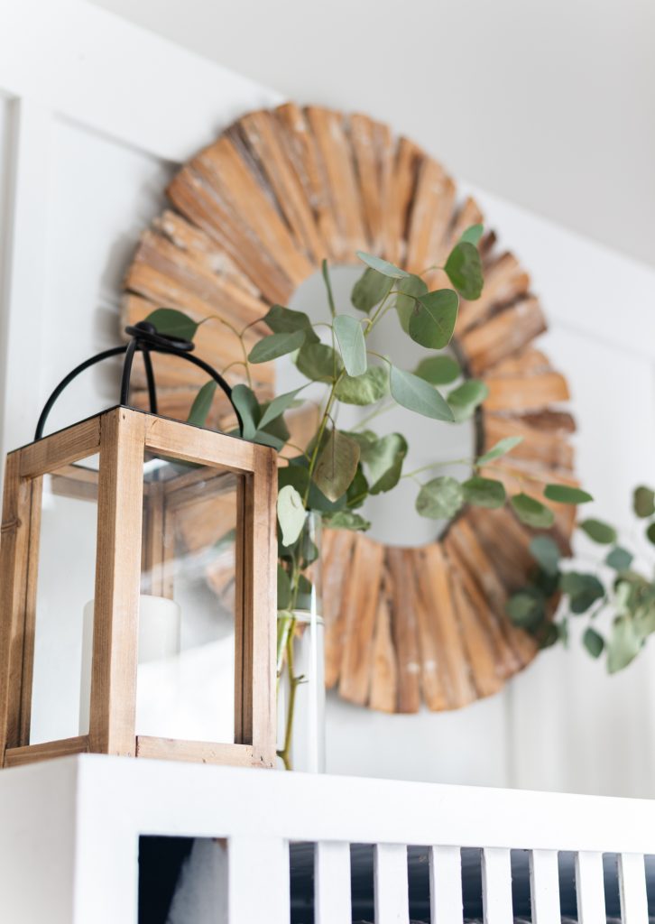 Simple mantel with eucalyptus stems