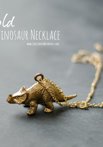 gold dinosaur necklace