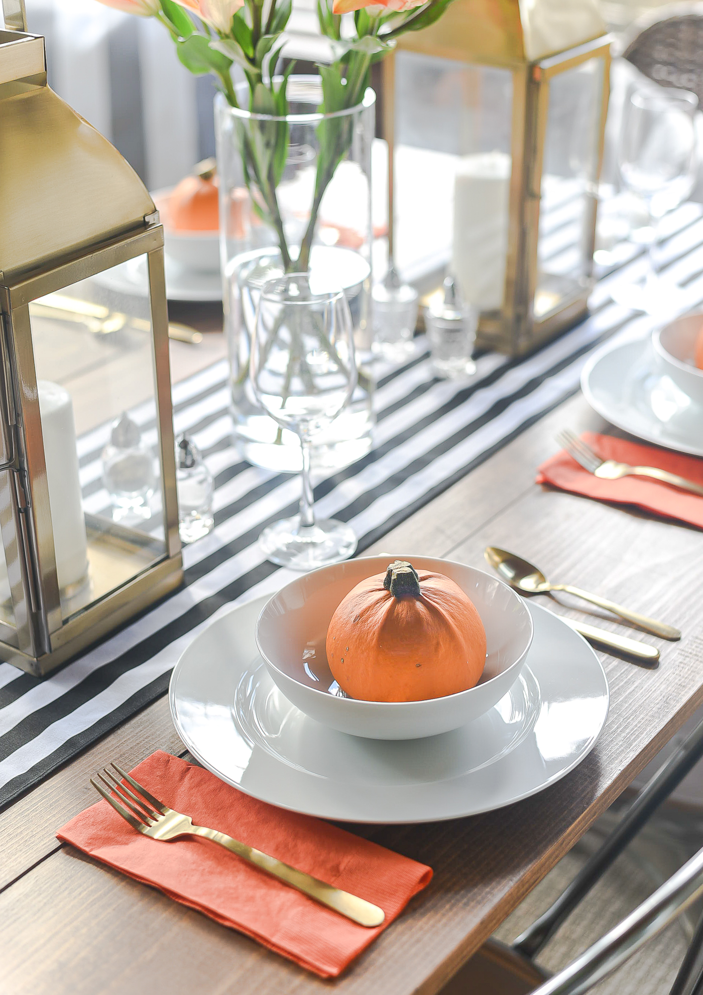 Fall Table Setting in Orange, Black & White - Black White Striped Table Runner - Pumpkins, Orange Napkins, White Plates, Gold Flatware
