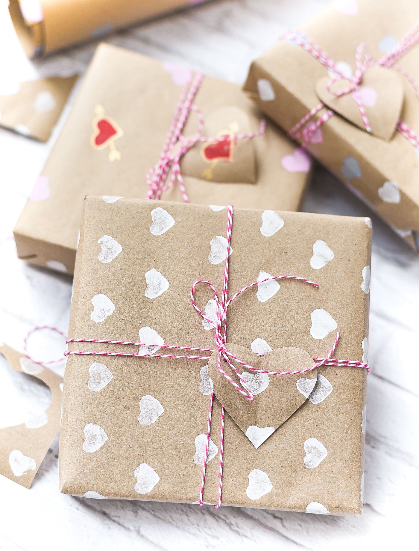 Valentine Day Wrapping Paper DIY - Homemade Wrapping Paper Tutorial for Valentine - Heart Wrapping Paper Made with Heart Stamps.