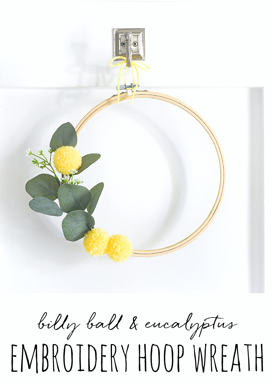 Embroidery Hoop Wreath with Faux Billy Ball Pom Poms - Yellow Summer Wreath Idea. Summer Embroidery Hoop Wreath in yellow with eucalyptus.