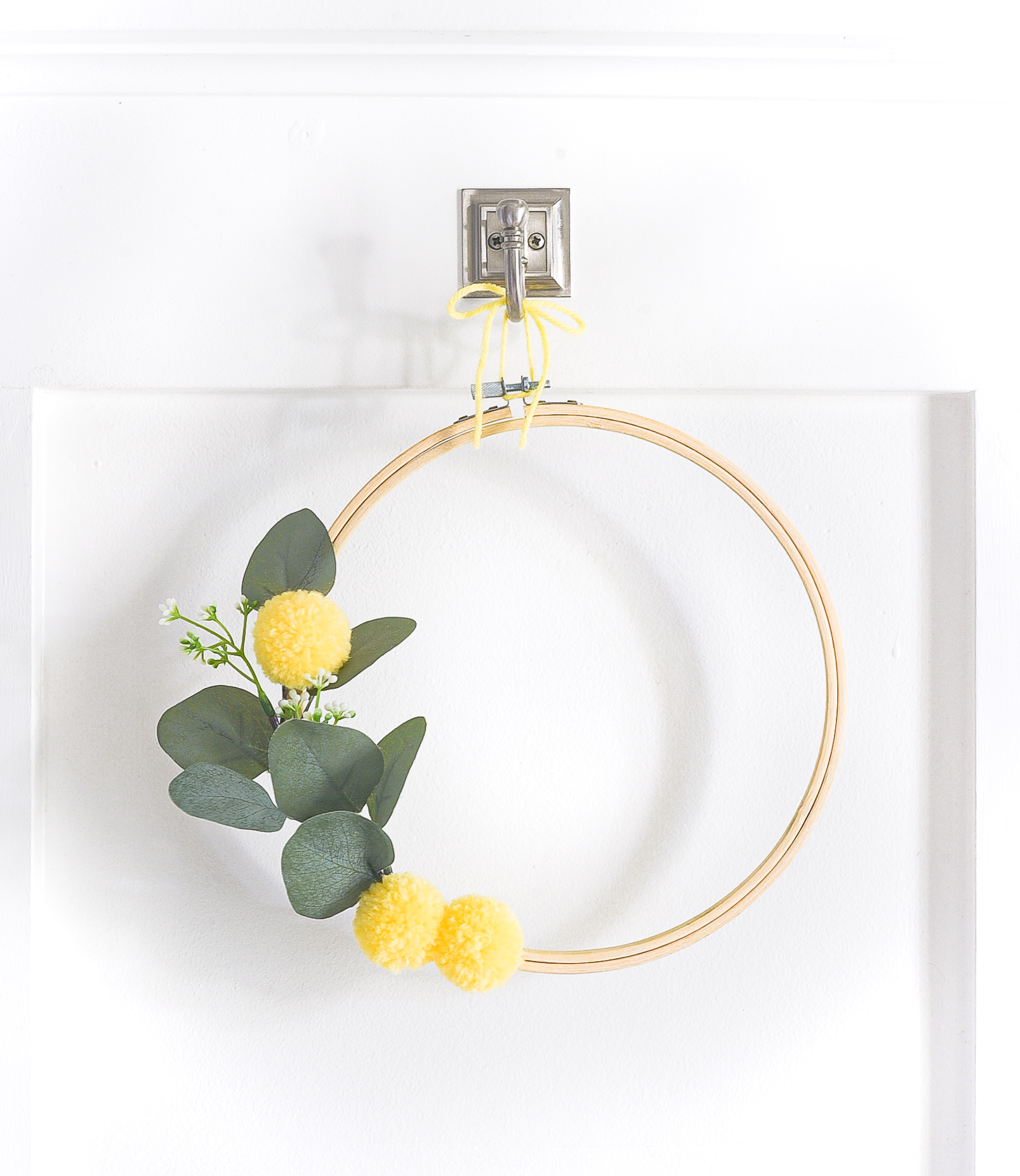 Embroidery Hoop Wreath with Faux Bill Ball Pom Poms - Yellow Summer Wreath Idea. Summer Embroidery Hoop Wreath with Faux Bill Ball Pom Poms.