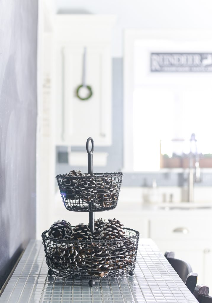 Christmas Kitchen with Mini Wreaths on Kitchen Cabinet Doors. How to Hange Mini Wreaths on Cabinet Doors. Mini Wreaths with Black and White Ribbon Decor Ideas. Black and White Christmas Decor Ideas.
