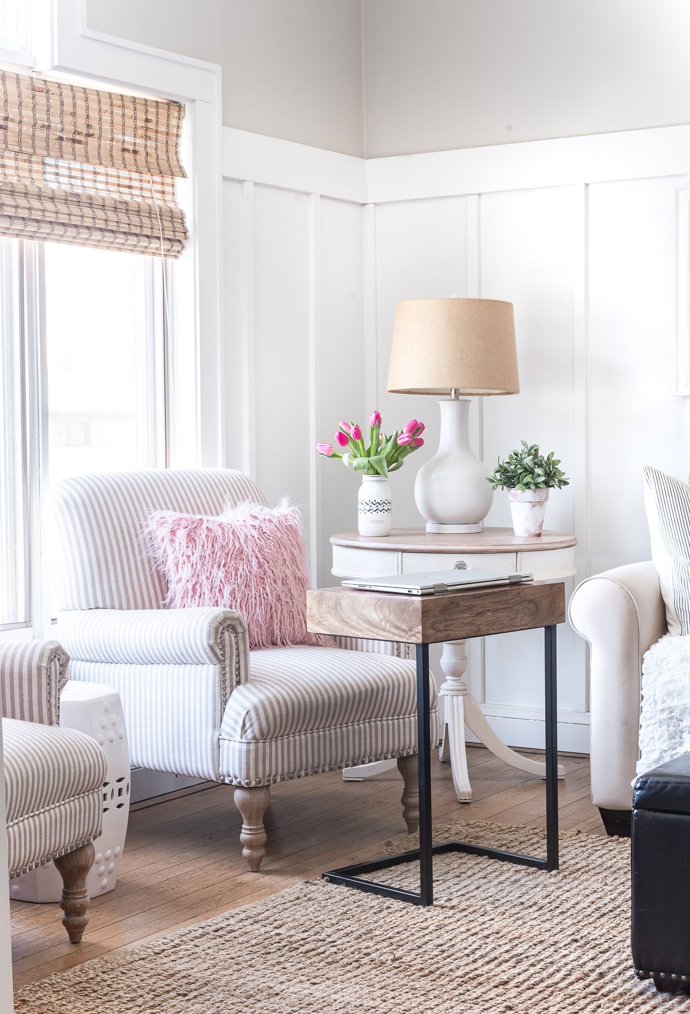 Board and batten living room with gray walls - Spring decorating ideas in pink and gray - pink and gray living room for spring.