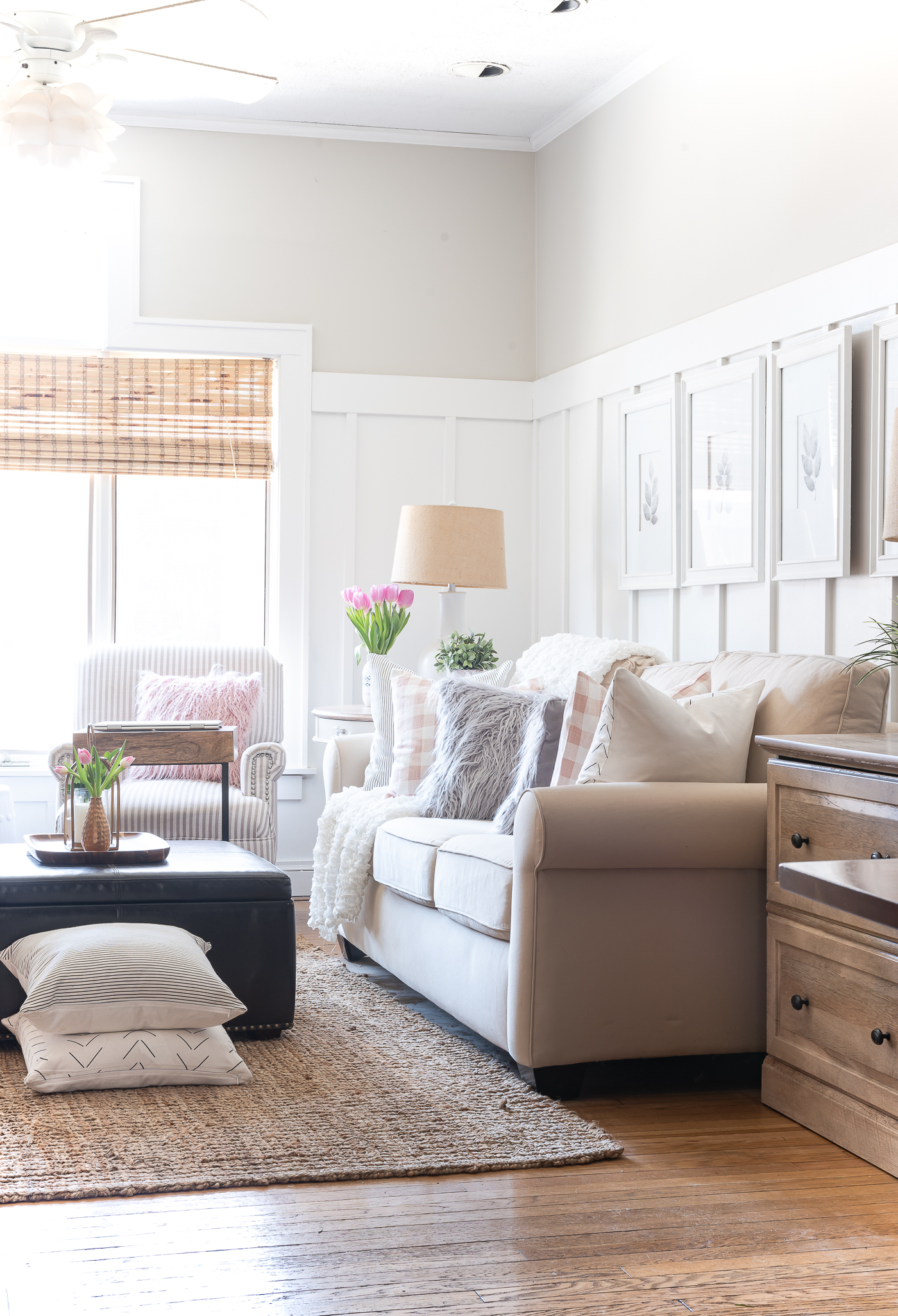 Board and batten living room with gray walls - Spring decorating ideas in pink and gray - pink and gray living room for spring.