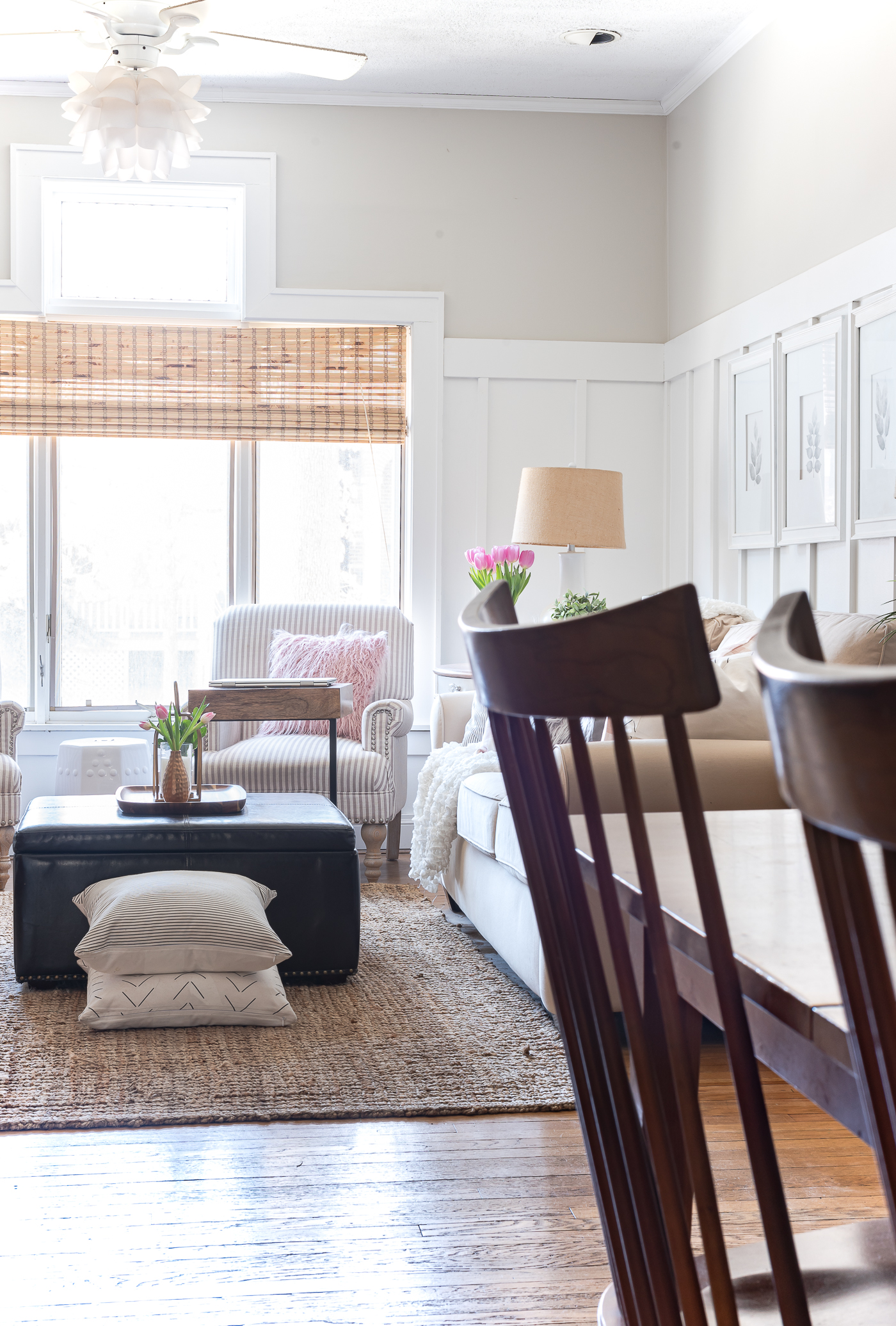 Board and batten living room with gray walls - Spring decorating ideas in pink and gray - pink and gray living room for spring.