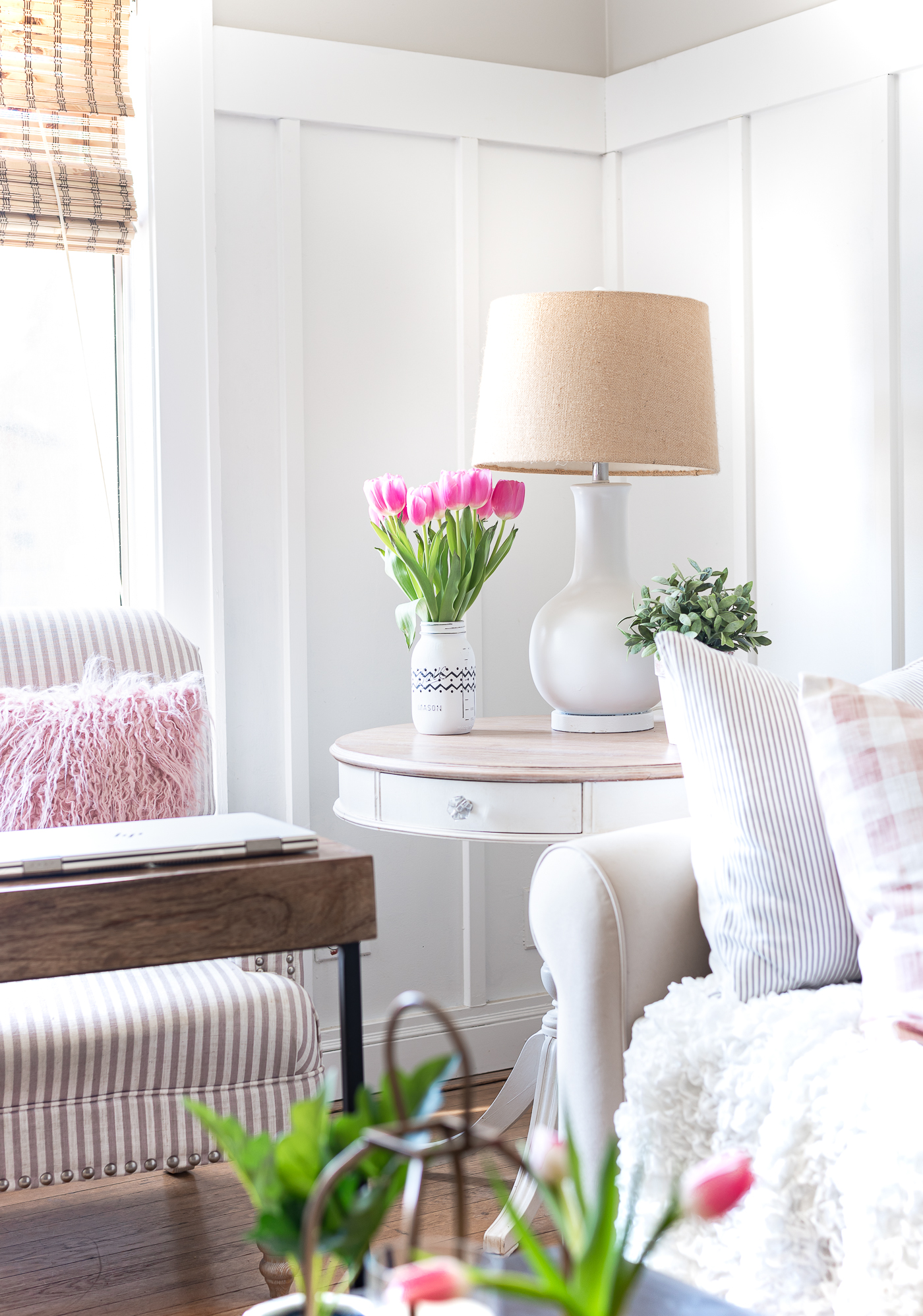 Board and batten living room with gray walls - Spring decorating ideas in pink and gray - pink and gray living room for spring.