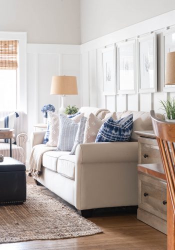 Pottery Barn Couch in Beige, Tan, Neutral; Board and Batten Walls, Gray Walls, Blue and White Spring Decor Ideas
