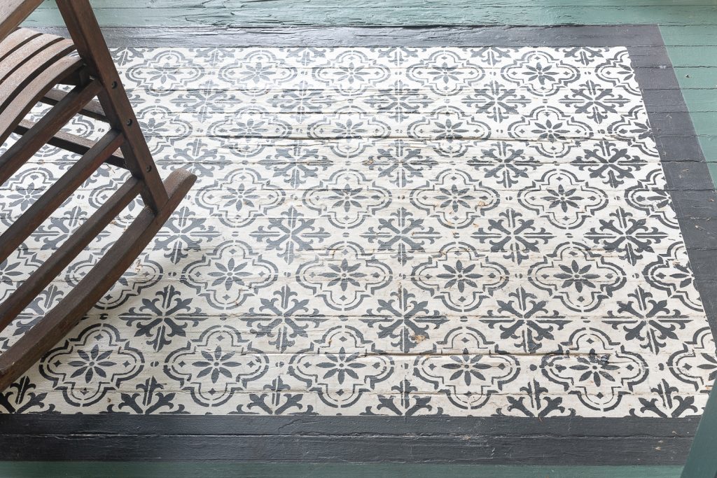 How to stencil a rug on your front porch with chalk paint. Chalk paint stencil how to. Painting rug on porch landing.