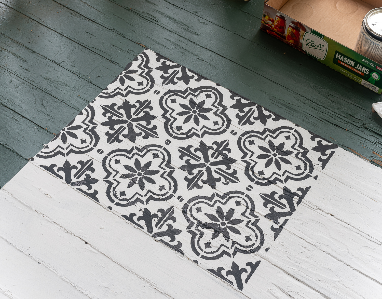 How to stencil a rug on your front porch with chalk paint. Chalk paint stencil how to. Painting rug on porch landing.