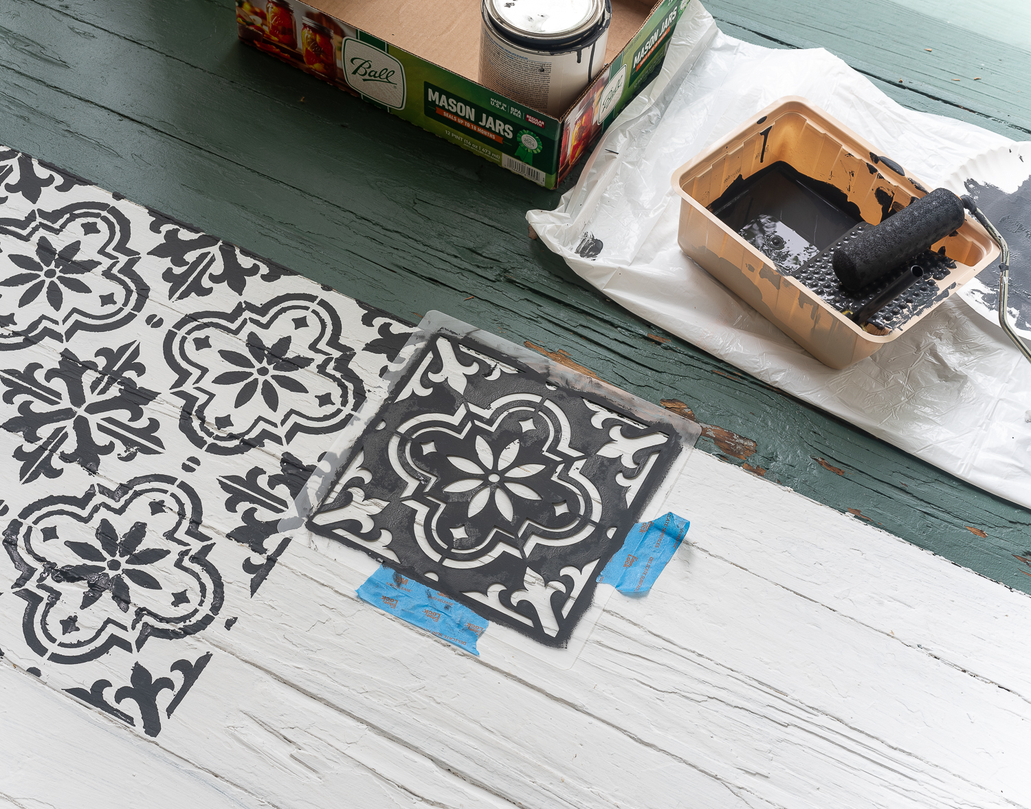 How to stencil a rug on your front porch with chalk paint. Chalk paint stencil how to. Painting rug on porch landing.