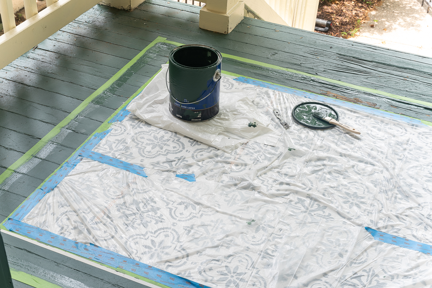 How to stencil a rug on your front porch with chalk paint. Chalk paint stencil how to. Painting rug on porch landing.