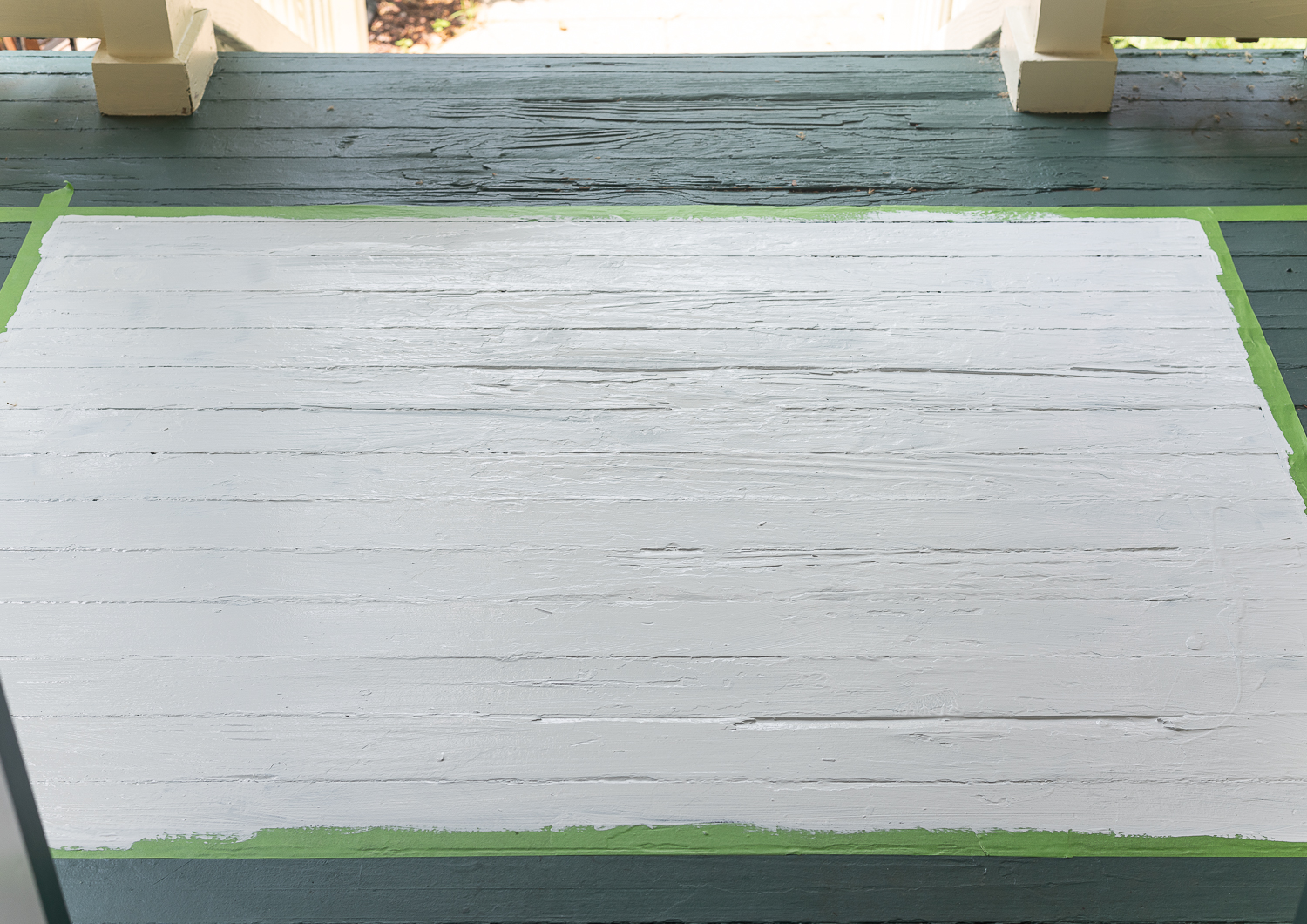 How to stencil a rug on your front porch with chalk paint. Chalk paint stencil how to. Painting rug on porch landing.