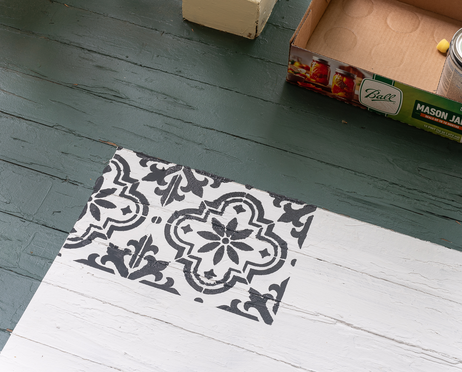 How to stencil a rug on your front porch with chalk paint. Chalk paint stencil how to. Painting rug on porch landing.