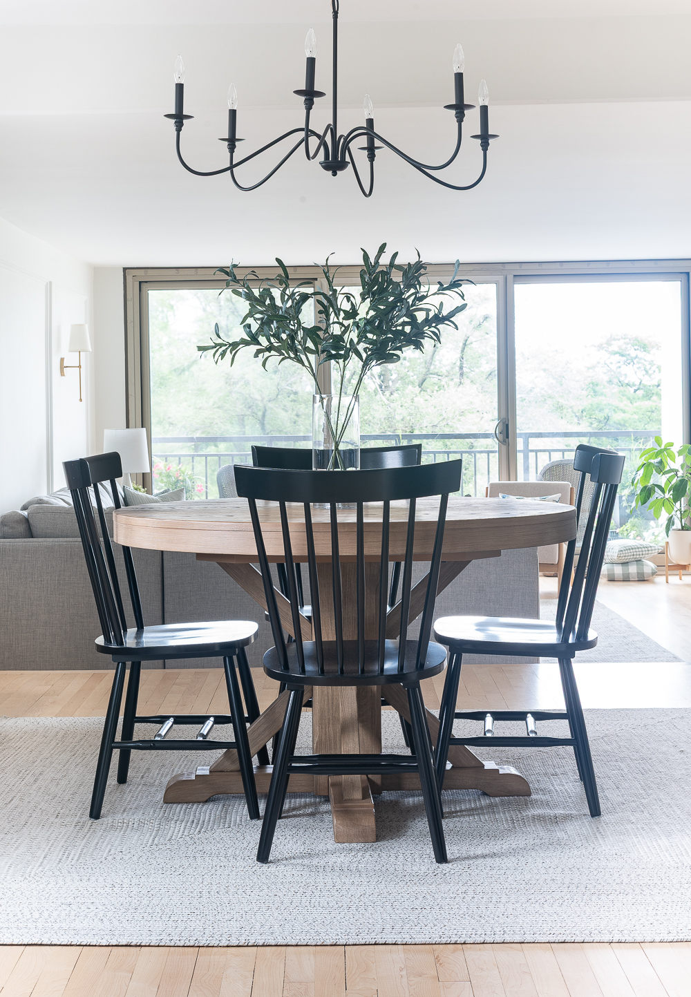 Neutral, White, Wood, Black Dining Room - Chicago Condo Dining Room Reveal - Black Iron Chandelier, Round Table, Black Windsor Chairs