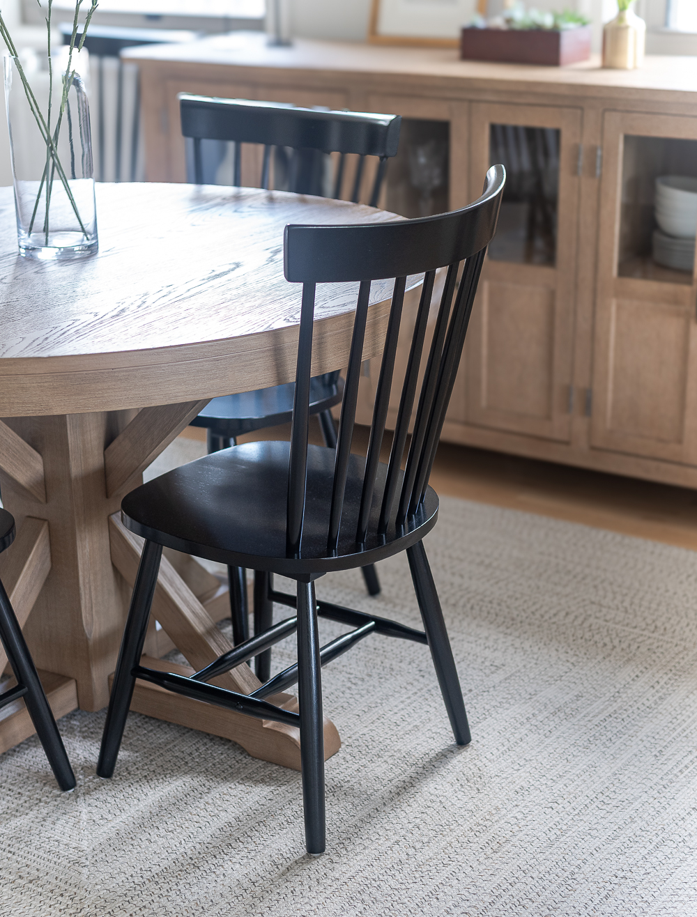 Neutral, White, Wood, Black Dining Room - Chicago Condo Dining Room Reveal - Black Iron Chandelier, Round Table, Black Windsor Chairs