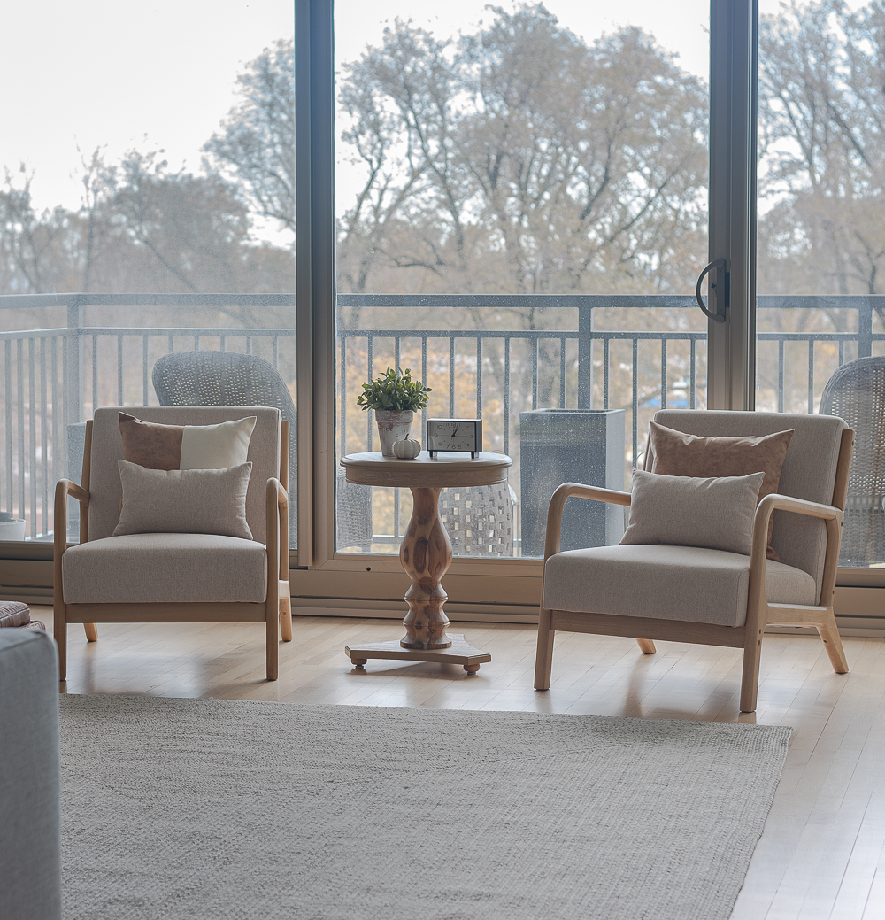 Fall Living Room in Rust, Brown, Mustard, Black, Gray, Neutral. Mustard PIllow. Faux Leather Ottomon from Amazon. Crate & Barrel Barrett Sectional Sofa. Pottery Barn TV Console. Wayfair Side Tables in Light Wood. Vintage Cow Print on Canvas.
