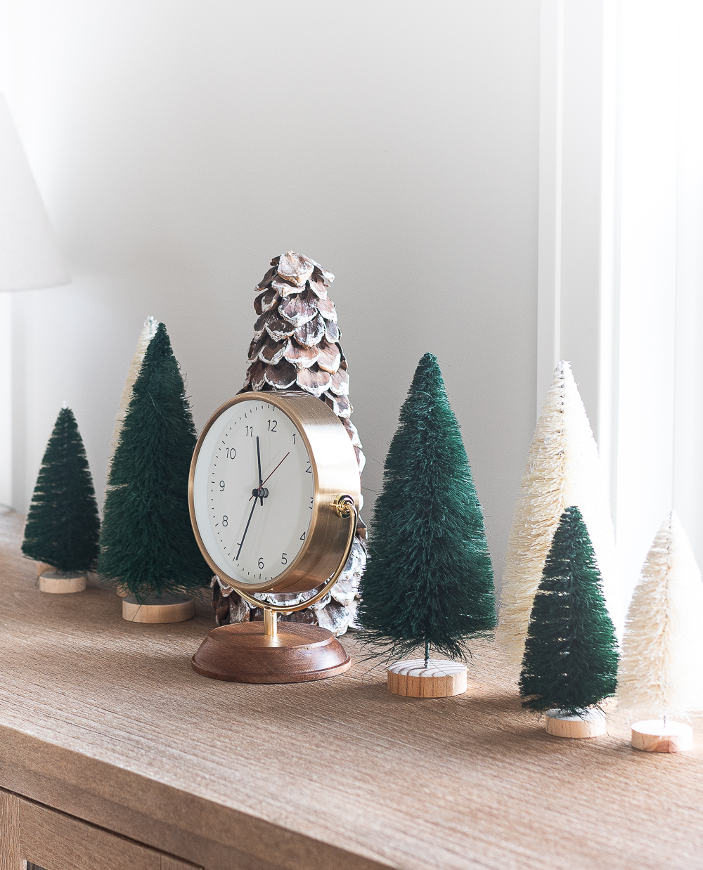 Christmas in the Dining Room. Neutral Christmas with Khaki Velvet Bows, Browns, Burgundies, Gold. Rustic Christmas Tree with Painted Pine Cones, Neutral Light Brown Velvet Ribbons, Gold, Burgundy, Brown Balls.