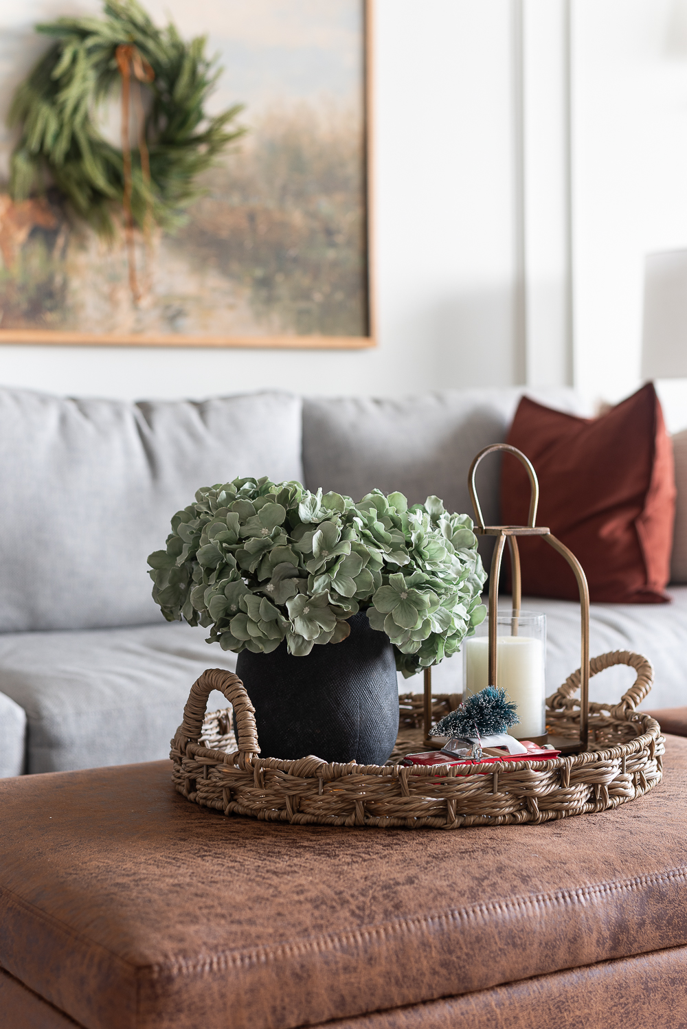 Neutral Christmas Decor in Khaki Velvet, Brown, Burgundy, White & Gold. Christmas in Chicago Condo. Christmas in Living Room Decorating Ideas. Hanging Wreaths on Pictures with thin Velvet Ribbon and Bows. Christmas in Brown, Burgundy, Tan, Khaki, Gold, White.